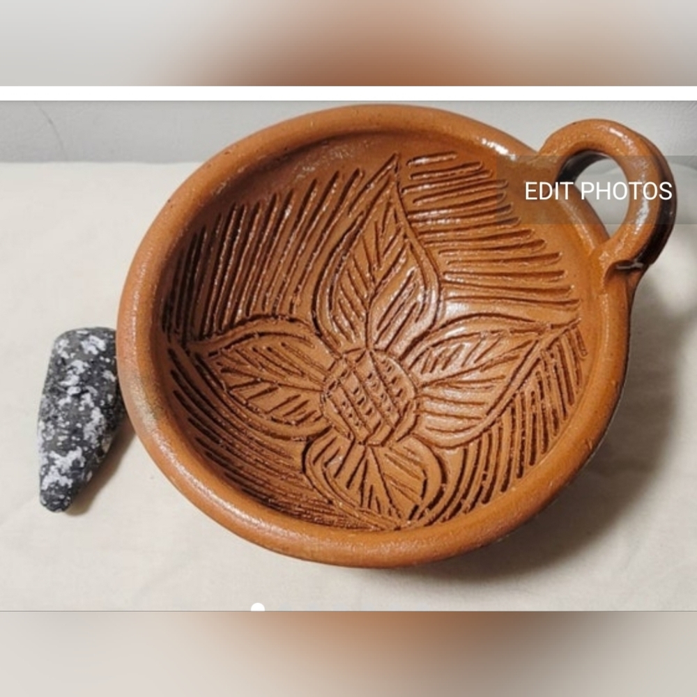 Clay molcajete with stone
